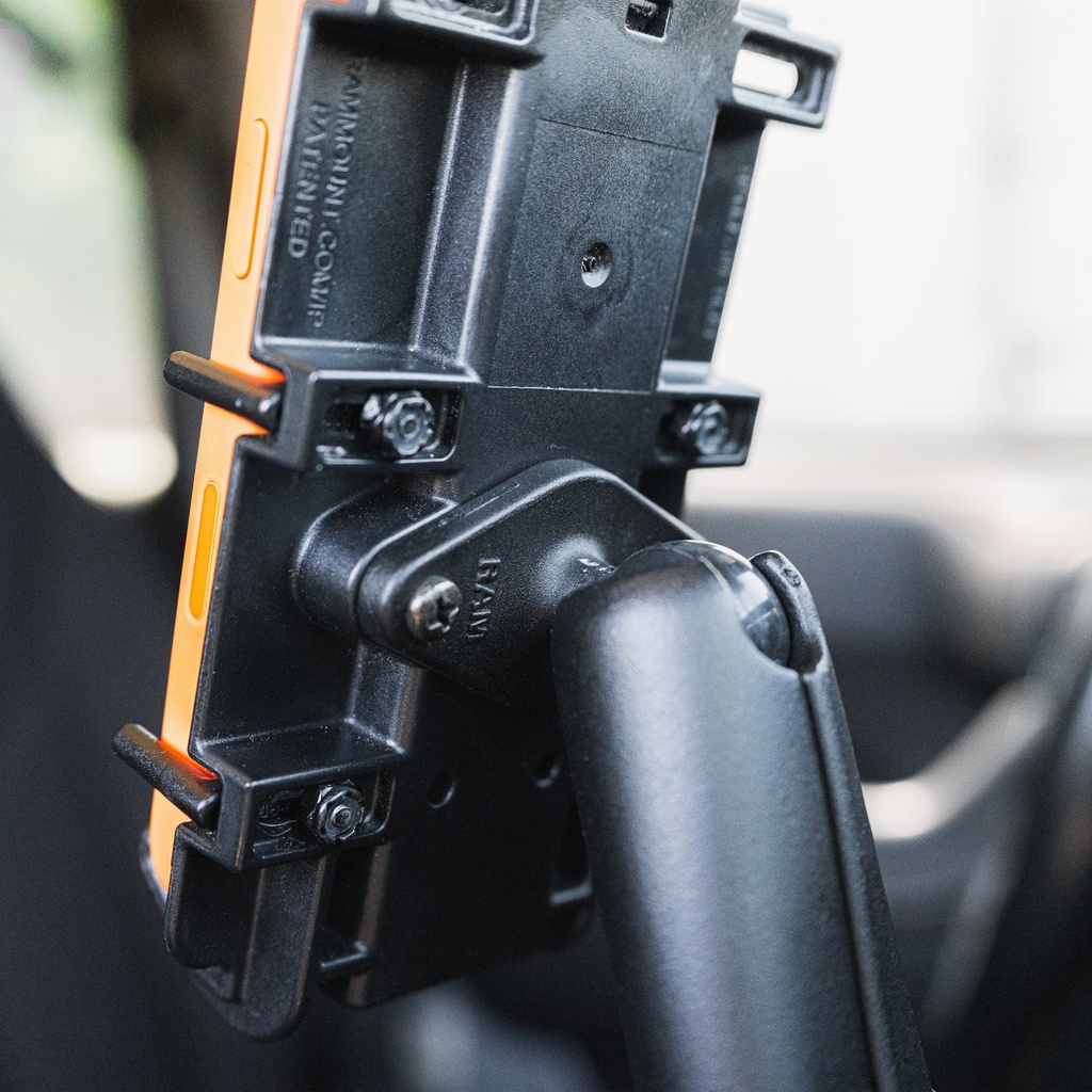 RAM Diamond Ball Base - close-up in a real cab mount with phone cradle
