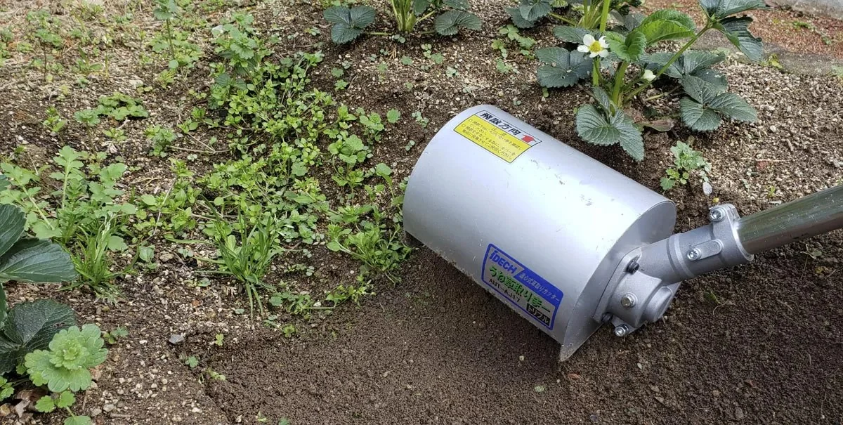 IDECH Weed Hammer Blade elex - crushing weeds in a bed