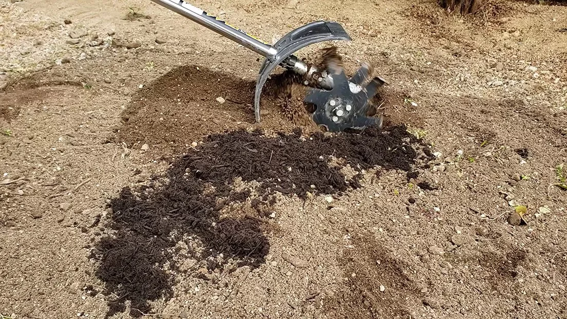 IDECH Quick Tiller elex in use - tilling soil